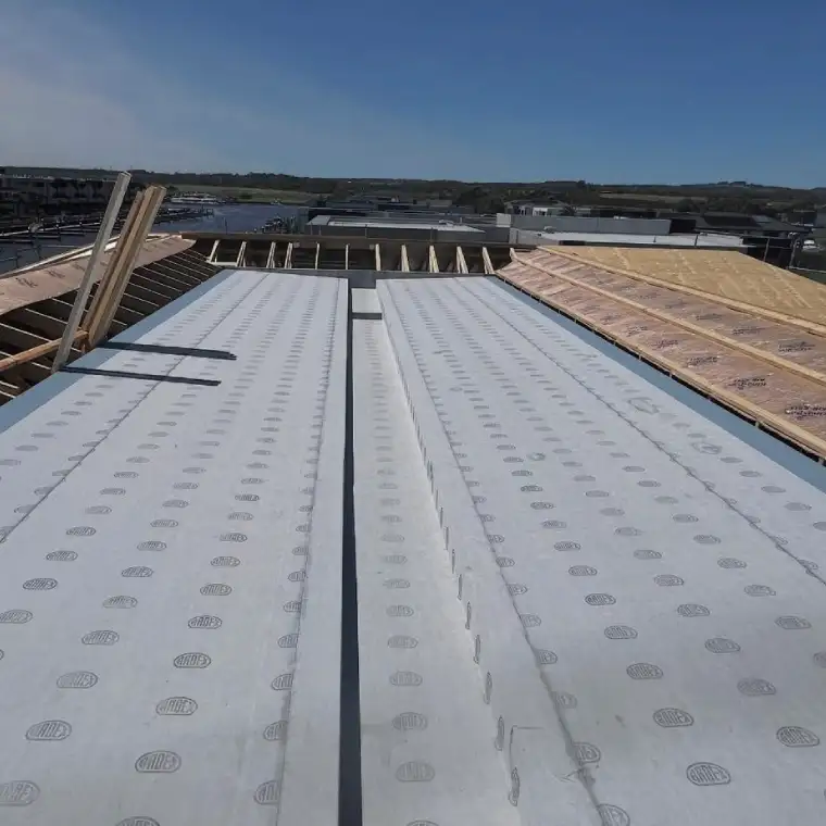 Commercial construction site featuring compliant ARDEX WPM membrane waterproofing